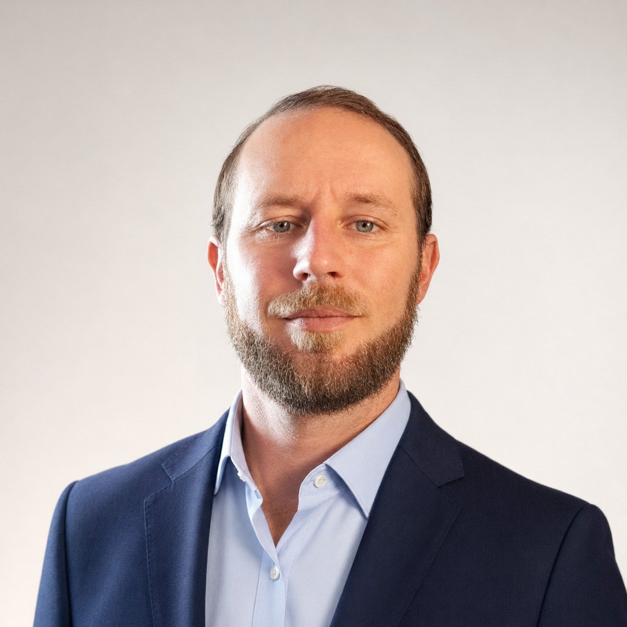 Professional headshot of Max Uland